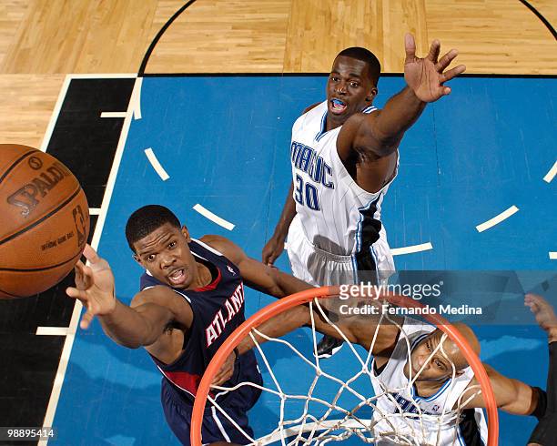 Joe Johnson of the Atlanta Hawks dunks against Brandon Bass of the Orlando Magic in Game Two of the Eastern Conference Semifinals during the 2010 NBA...