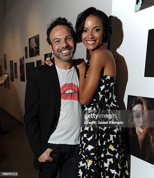 Photographer Michael Angelo and model Selita Ebanks attend the preview of "The Lipstick Portraits" exhibition at the 401 Projects on May 6, 2010 in...
