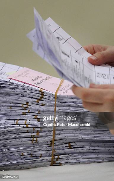 Ballot papers are counted in the constituency of Conservative Party leader David Cameron on May 7, 2010 in Witney, England. After 5 weeks of...