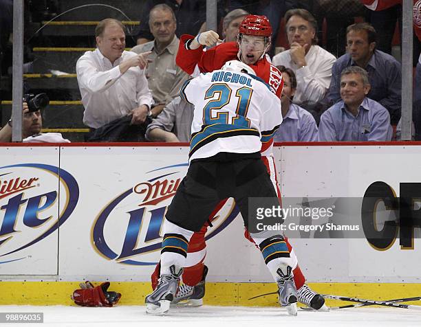 Justin Abdelkader of the Detroit Red Wings fights Scott Nichol of the San Jose Sharks during Game Four of the Western Conference Semifinals of the...