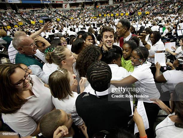 Kris Allen, winner of "American Idol" season 8, gets mobbed after performing in front of 1,100 elementary student musicians as part of VH1's Save the...