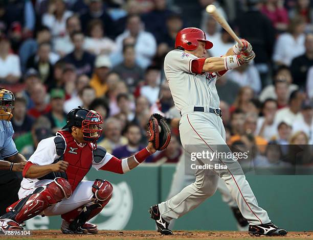 Hideki Matsui of the Los Angeles Angels of Anaheim struggles in his at bat in the first inning as Victor Martinez the Boston Red Sox defends on May...