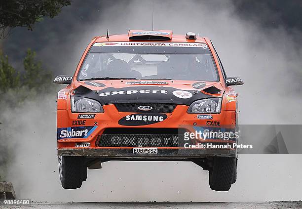 Henning Solberg of Norway and co-driver Ilka Minor drive their Ford Focus RS WRC 08 during stage 2 of the WRC Rally of New Zealand at Waipu on May 7,...