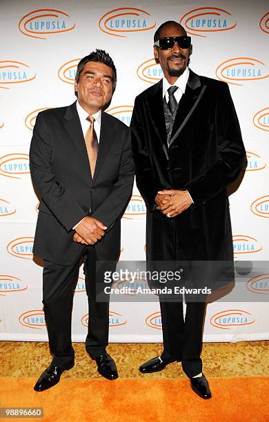 Actor George Lopez and rapper Snoop Dogg arrive at the 2010 Lupus LA Orange Ball at the Beverly Wilshire Four Seasons Hotel on May 6, 2010 in Beverly...