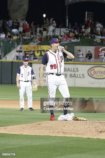 Actor Will "Rojo Johnson" Ferrell pitches for the Round Rock Express at The Dell Diamond on May 6, 2010 in Round Rock, Texas.
