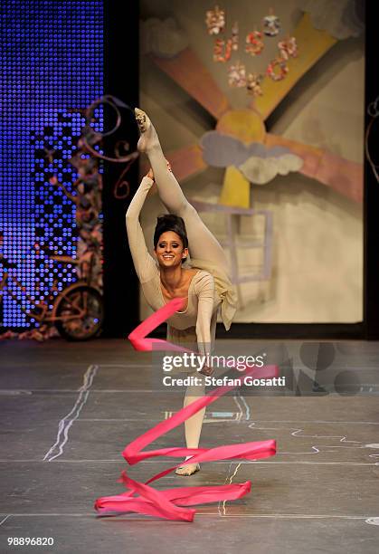 Model showcases her ribbon twirling skills on the catwalk during the Ms Unkon collection show on the fifth and final day of Rosemount Australian...