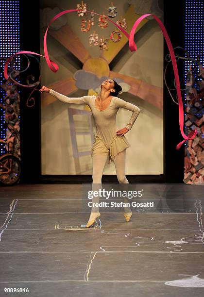 Model showcases her gymnastic moves on the catwalk during the Ms Unkon collection show on the fifth and final day of Rosemount Australian Fashion...