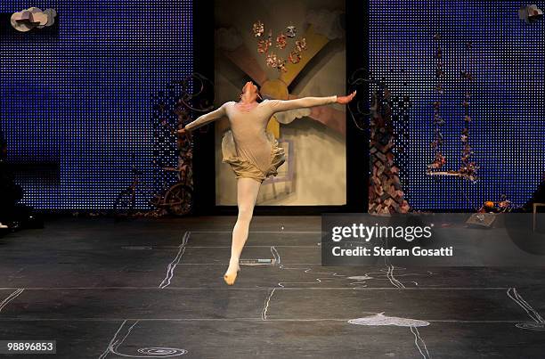 Model showcases her gymnastic moves on the catwalk during the Ms Unkon collection show on the fifth and final day of Rosemount Australian Fashion...