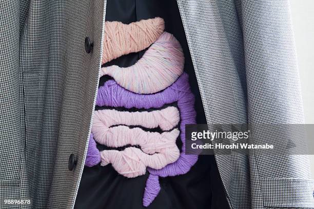 a  jacket with the applique of the internal organs - human intestine stock-fotos und bilder