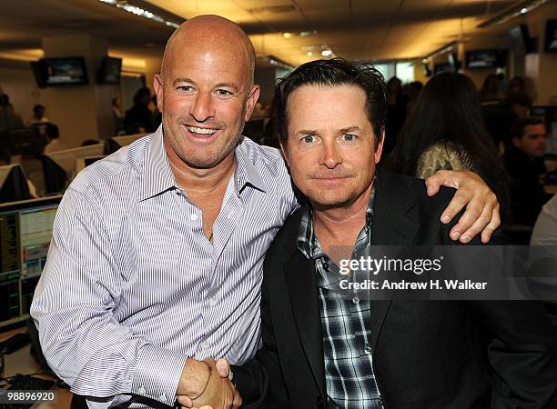 Co-founder Steven Starker and Michael J. Fox attend the 8th Annual Commissions for Charity Day at BTIG on May 6, 2010 in New York City.