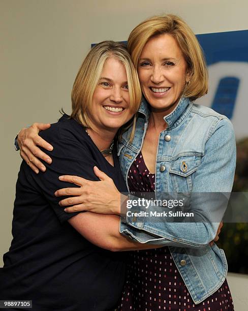 Photographer Robin Layton and Felicity Huffman attend Robin Layton's art opening on May 6, 2010 in West Hollywood, California.