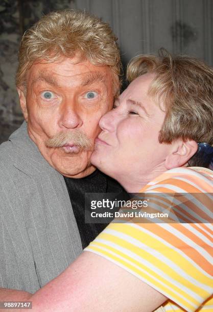 Actor Rip Taylor and a guest attend the Hollywood Museum's reception for Jeran Design's graffiti gown at the Hollywood History Museum on May 6, 2010...