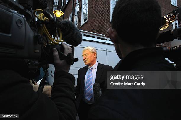 Ex-Liberal Democrats leader Paddy Ashdown speaks with waiting media outside the Liberal Democrats party headquarters as the results of the UK General...