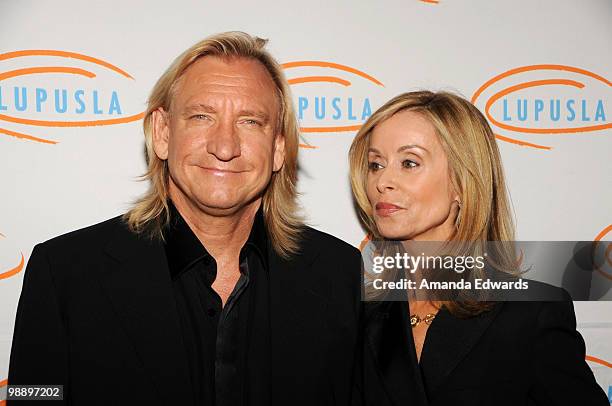 Musician Joe Walsh and his wife Marjorie arrive at the 2010 Lupus LA Orange Ball at the Beverly Wilshire Four Seasons Hotel on May 6, 2010 in Beverly...