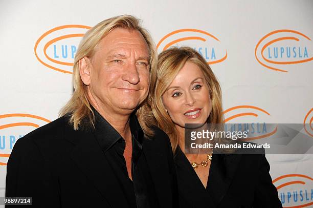 Musician Joe Walsh and his wife Marjorie arrive at the 2010 Lupus LA Orange Ball at the Beverly Wilshire Four Seasons Hotel on May 6, 2010 in Beverly...