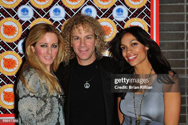 Lexi Bryan, musician David Bryan, and Rosario Dawson attend Rosario Dawson's birthday party at Trump SoHo on May 6, 2010 in New York City.