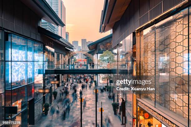 busy shopping street,chengdu,sichuan,china. - mass consumerism stock pictures, royalty-free photos & images