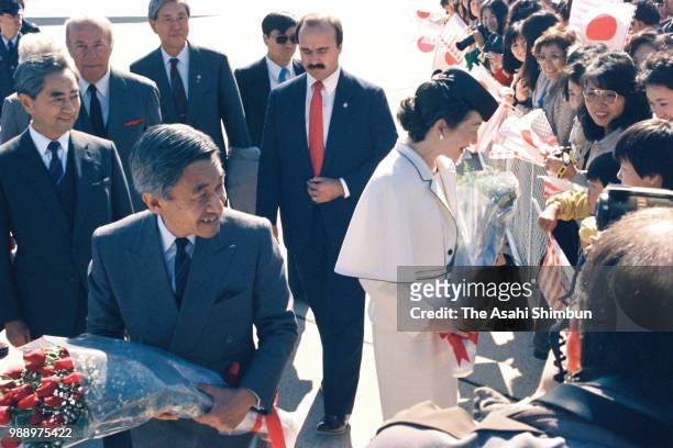 Crown Prince Akihito and Crown Princess Michiko are seen on arrival at the Joint Base Andrews on October 5, 1987 in Joint Base Andrews, Maryland.