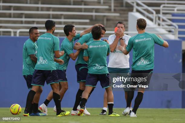 Players of Club Santos Laguna joke during a training session at Cotton Bowl on June 29, 2018 in Dallas, Texas.