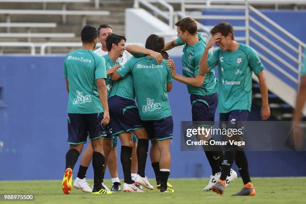 Players of Club Santos Laguna joke during a training session at Cotton Bowl on June 29, 2018 in Dallas, Texas.