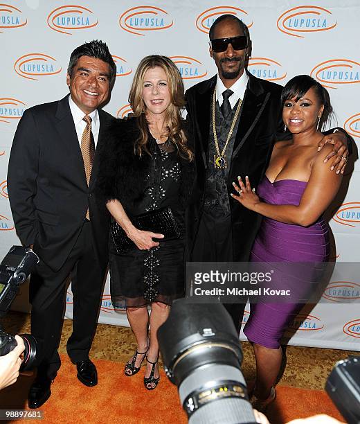 Comedian George Lopez, actress Rita Wilson, musician Snoop Dogg, and Shante Broadus arrive at the 10th Annual Lupus LA Orange Ball at the Beverly...