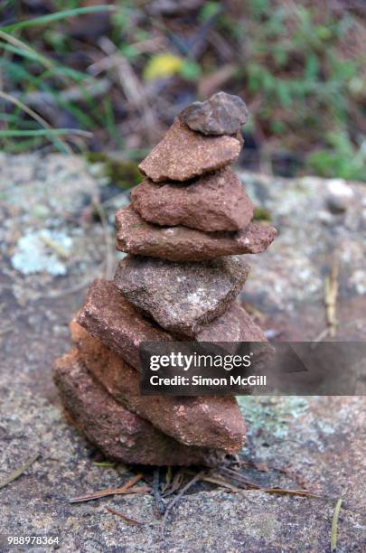 close-up of stone stacked into a rock cairn - bowral new south wales stock pictures, royalty-free photos & images
