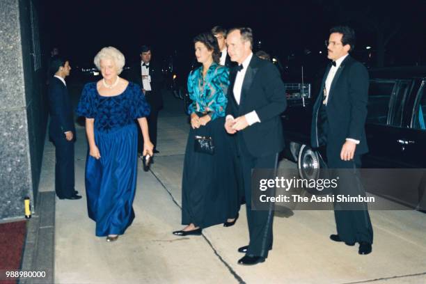 Vice President George Bush and his wife Barbara are seen on arrival at a reception hosted by Crown Prince Akihito and Crown Princess Michiko at the...
