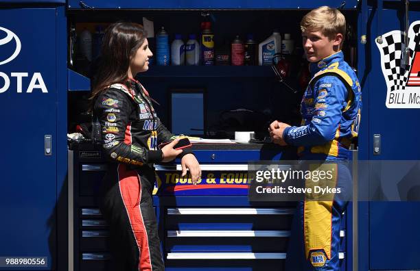 Hailie Deegan speaks with Derek Kraus in the pits before the Clint Newell Toyota 150 presented by NAPA Auto Parts for the NASCAR K&N West Series at...