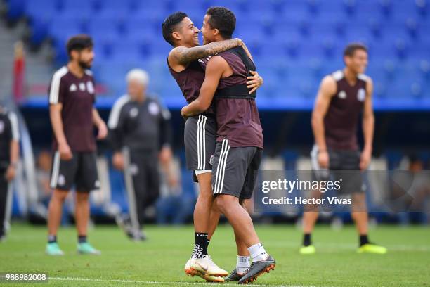 Javier Aquino and Giovani dos Santos of Mexico, celebrate during a training at Samara Arena ahead of the Round of Sixteen match against Brazil on...