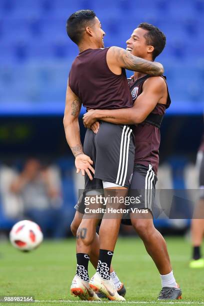 Javier Aquino and Giovani dos Santos of Mexico, celebrate during a training at Samara Arena ahead of the Round of Sixteen match against Brazil on...