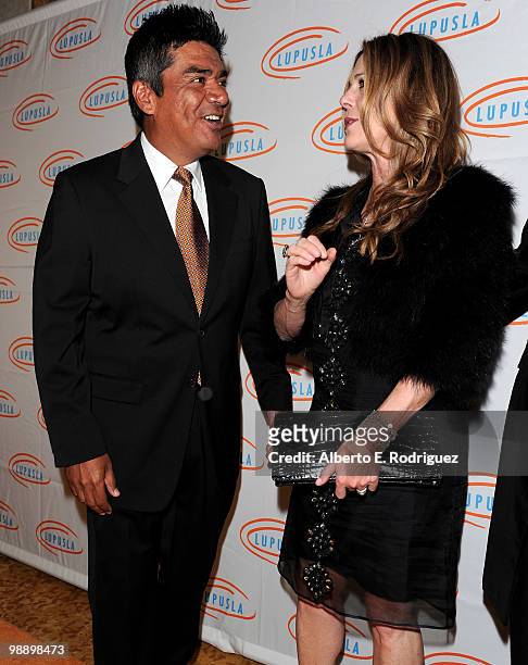 Comedian George Lopez and actress Rita Wilson arrive at the 10th Annual Lupus LA Orange Ball on May 6, 2010 in Beverly Hills, California.