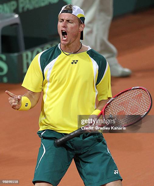 Lleyton Hewitt of Australia celebrates victory after his match against Totsuma Ito of Japan during the match between Australia and Japan on day one...