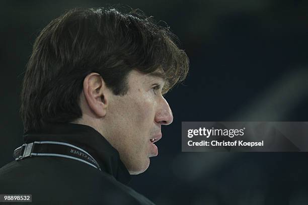 National coach Uwe Krupp of Germany looks on during a training session at the Veltins Arena ahead of the IIHF World Championship on May 6, 2010 in...