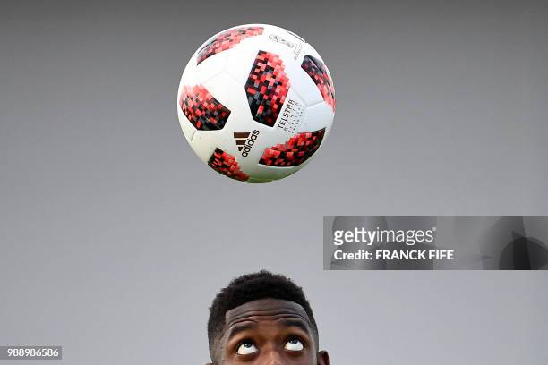 France's forward Ousmane Dembele juggles a ball during a training session at the Glebovets stadium in Istra, some 70 km west of Moscow, on July 1...