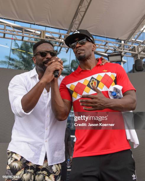 Irie and Jamie Foxx on stage at the Sprint IWXIV BBQ Beach Bash and Concert during Irie Weekend 2018 at the Fontainebleau Miami Beach on June 30,...