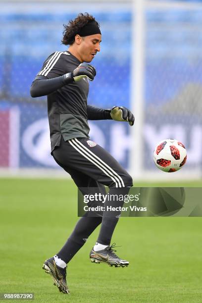 Guillermo Ochoa of Mexico, controls the ball during a training at Samara Arena ahead of the Round of Sixteen match against Brazil on July 1, 2018 in...