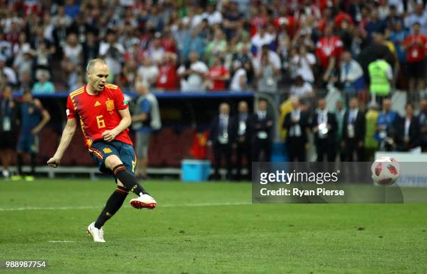 Andres Iniesta of Spain scores his team's first penalty in the penalty shoot out during the 2018 FIFA World Cup Russia Round of 16 match between...