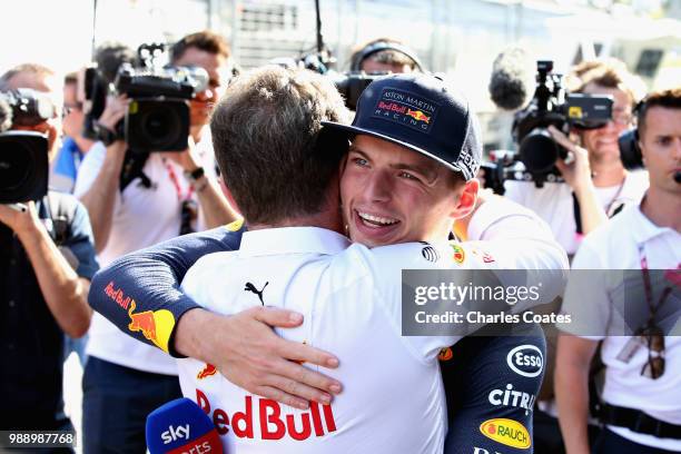 Race winner Max Verstappen of Netherlands and Red Bull Racing hugs Red Bull Racing Team Principal Christian Horner after the Formula One Grand Prix...