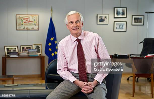 Michel Barnier, European Union internal market commissioner, poses for a photograph in his office at the EU commission headquarters in Brussels,...