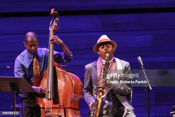 Archie Shepp and Avery Sharpe perform during the 2018 Festival International de Jazz de Montreal at Quartier des spectacles on June 30, 2018 in...