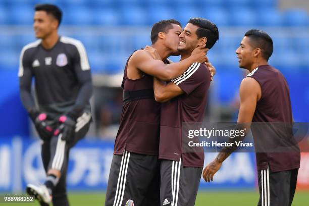 Giovani dos Santos and Carlos Vela of Mexico, during a training at Samara Arena ahead of the Round of Sixteen match against Brazil on July 1, 2018 in...