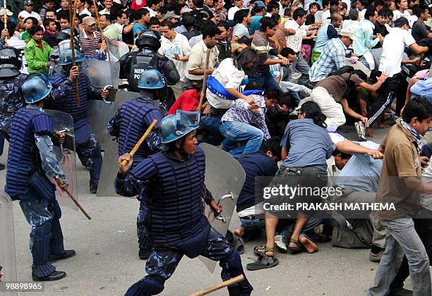 Nepal police clash with Maoist supporters in Kathmandu on May 7, 2010. The United States called on Nepal's Maoists to end a strike that has shut down...