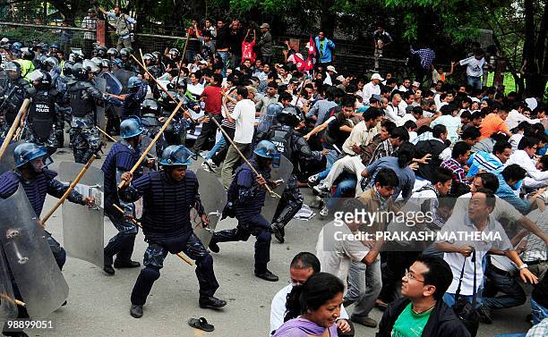 Nepal police clash with Maoist supporters in Kathmandu on May 7, 2010. The United States called on Nepal's Maoists to end a strike that has shut down...