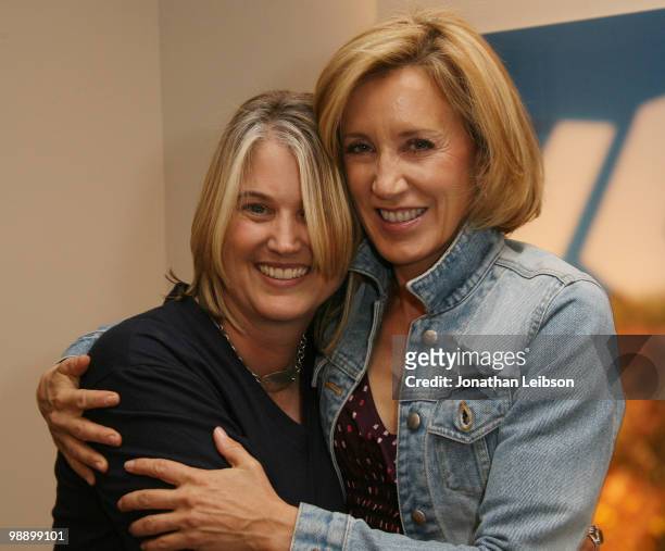 Robin Layton and Felicity Huffman attend Robin Layton Works Photography/Art Exhibit on May 6, 2010 in West Hollywood, California.