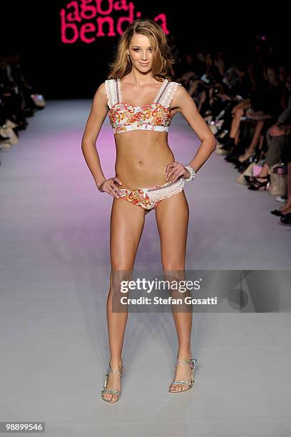 Model Jasmine Yarbrough showcases designs by Agua Bendita on the catwalk during the Swimwear Fashion Week At RAFW collection show on the fifth and...