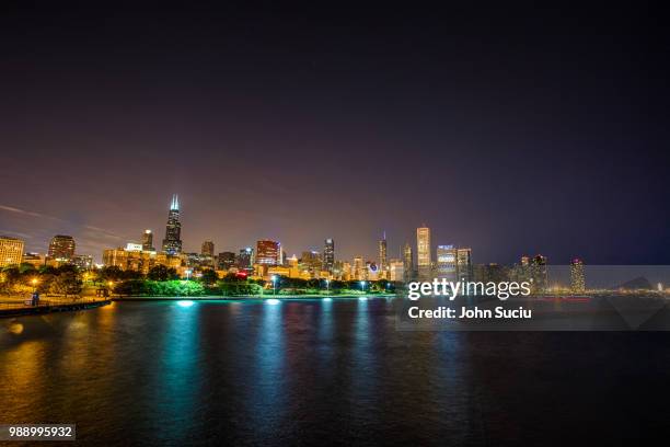 chicago skyline from adler planetarium - adler planetarium stock pictures, royalty-free photos & images