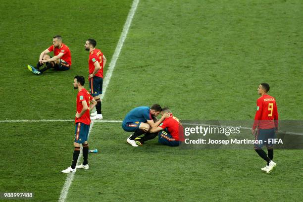 Spain players looked dejected following the 2018 FIFA World Cup Russia Round of 16 match between Spain and Russia at Luzhniki Stadium on July 1, 2018...