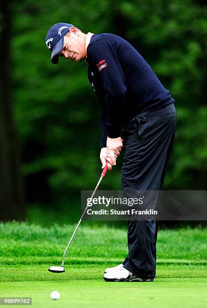 David Drysdale of Scotland putting on the fourth hole during the second round of the BMW Italian Open at Royal Park I Roveri on May 7, 2010 in Turin,...