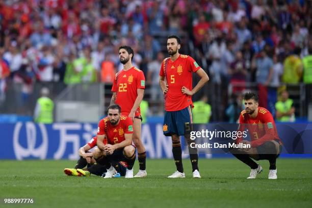 Spain players look dejected during penalty shoot out following the 2018 FIFA World Cup Russia Round of 16 match between Spain and Russia at Luzhniki...