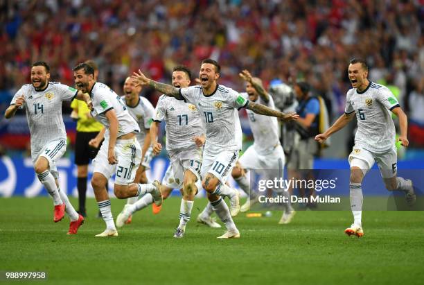 Russia players celebrate following their sides victory in a penalty shoot out during the 2018 FIFA World Cup Russia Round of 16 match between Spain...